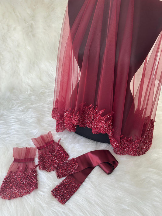 Burgundy bridal veil with beaded trim, matching beaded sash and wrist cuffs.