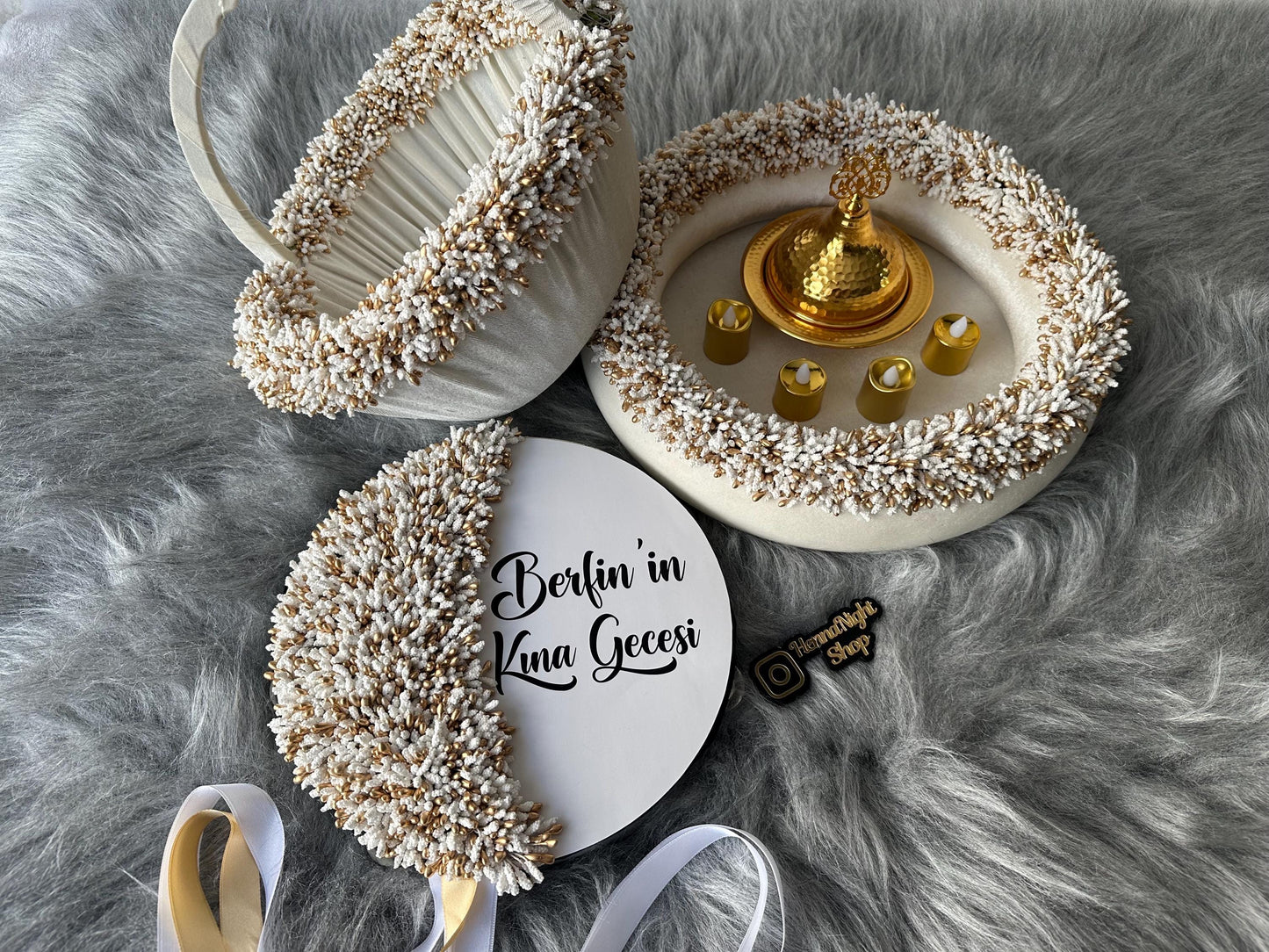 a gold dome with hand candles. white henna basket, personalized white henna tambourine, white henna tray