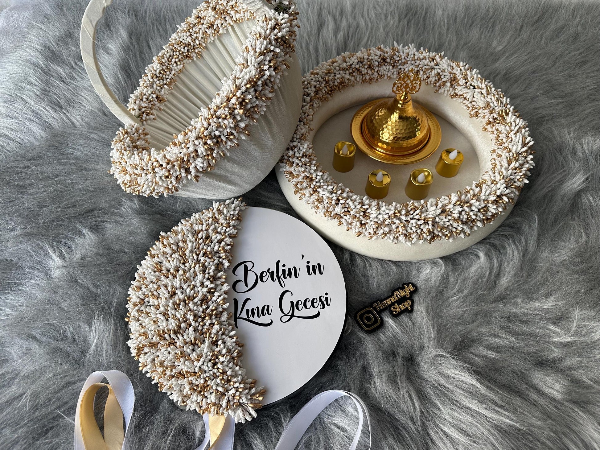 a gold dome with hand candles. white henna basket, personalized white henna tambourine, white henna tray
